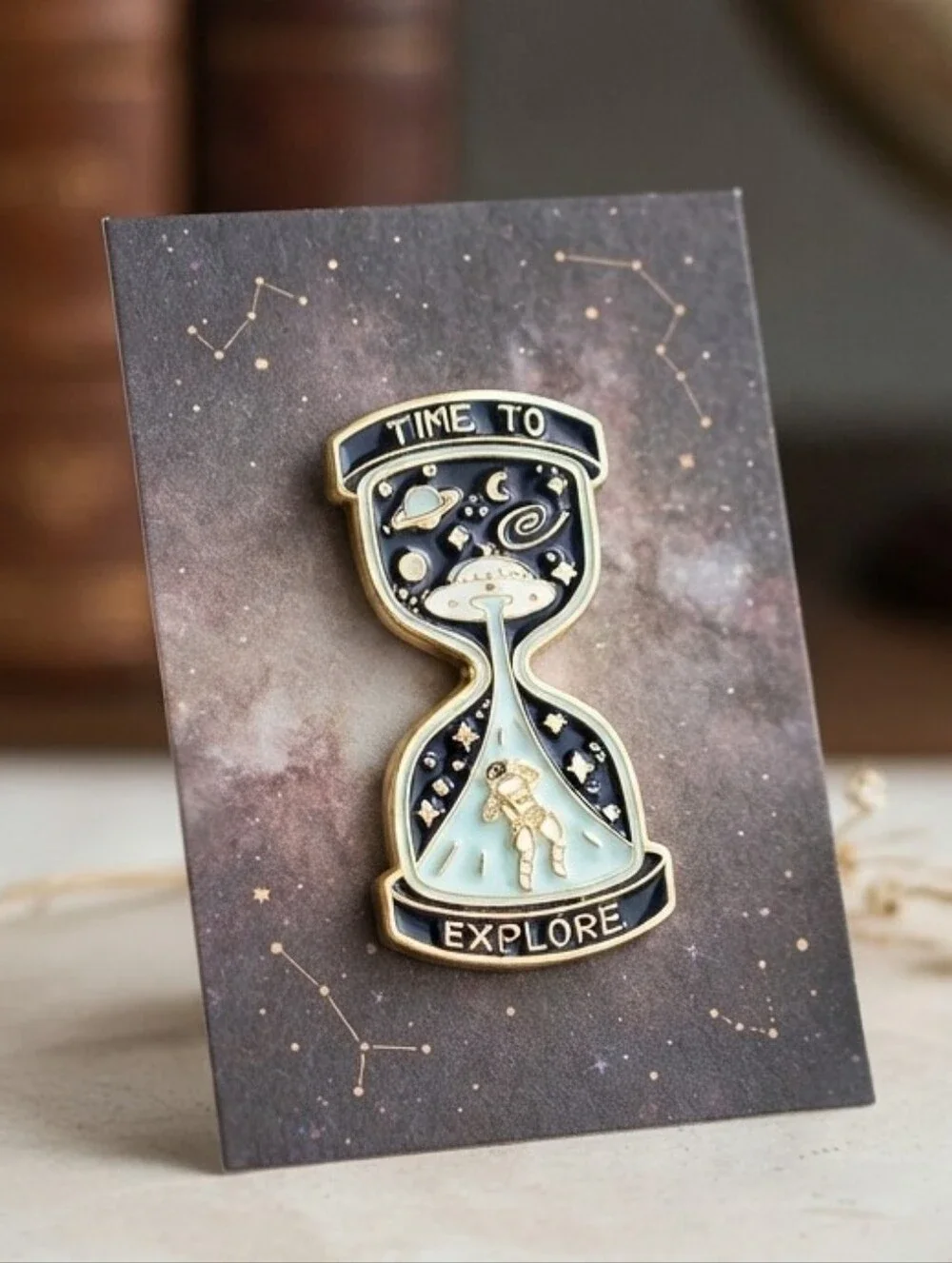 Celestial Hourglass Astronaut Enamel Pin: Cosmic Space Traveler 